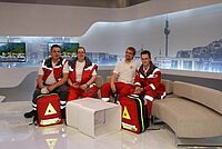 Gruppenbild von Sanitätern in einem Studio